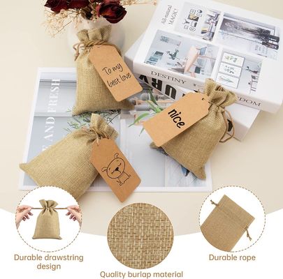 ドローストリング袋のバーラップの花の袋はギフトを袋に入れるDIYの技術の結婚披露宴、5X7のための宝石類の袋をじりじり動く袋に入れる