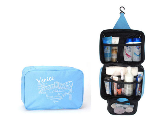 青いキャンバスは洗面用品袋、注文の印刷物が付いている旅行構造袋を掛けます